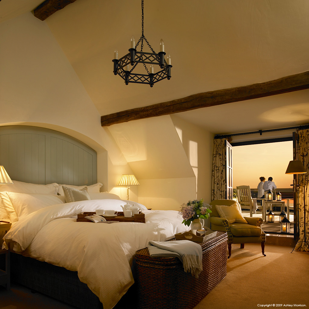 Bedroom suite in one of the Courtyard cottages at the Trump International Golf Links & Hotel in County Clare by Ashley Morrison.
