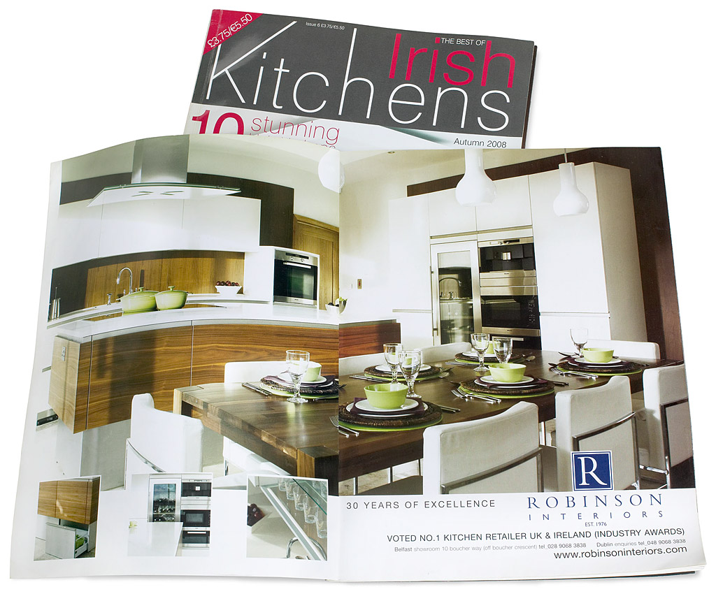 Double page ad by Robinson Interiors in the Autumn 2008 issue of Irish Kitchens magazine - featuring a Noes White & Walnut kitchen in Stuart Robinson's home near Drumbeg in County Down by Ashley Morrison and Marie McMillen.