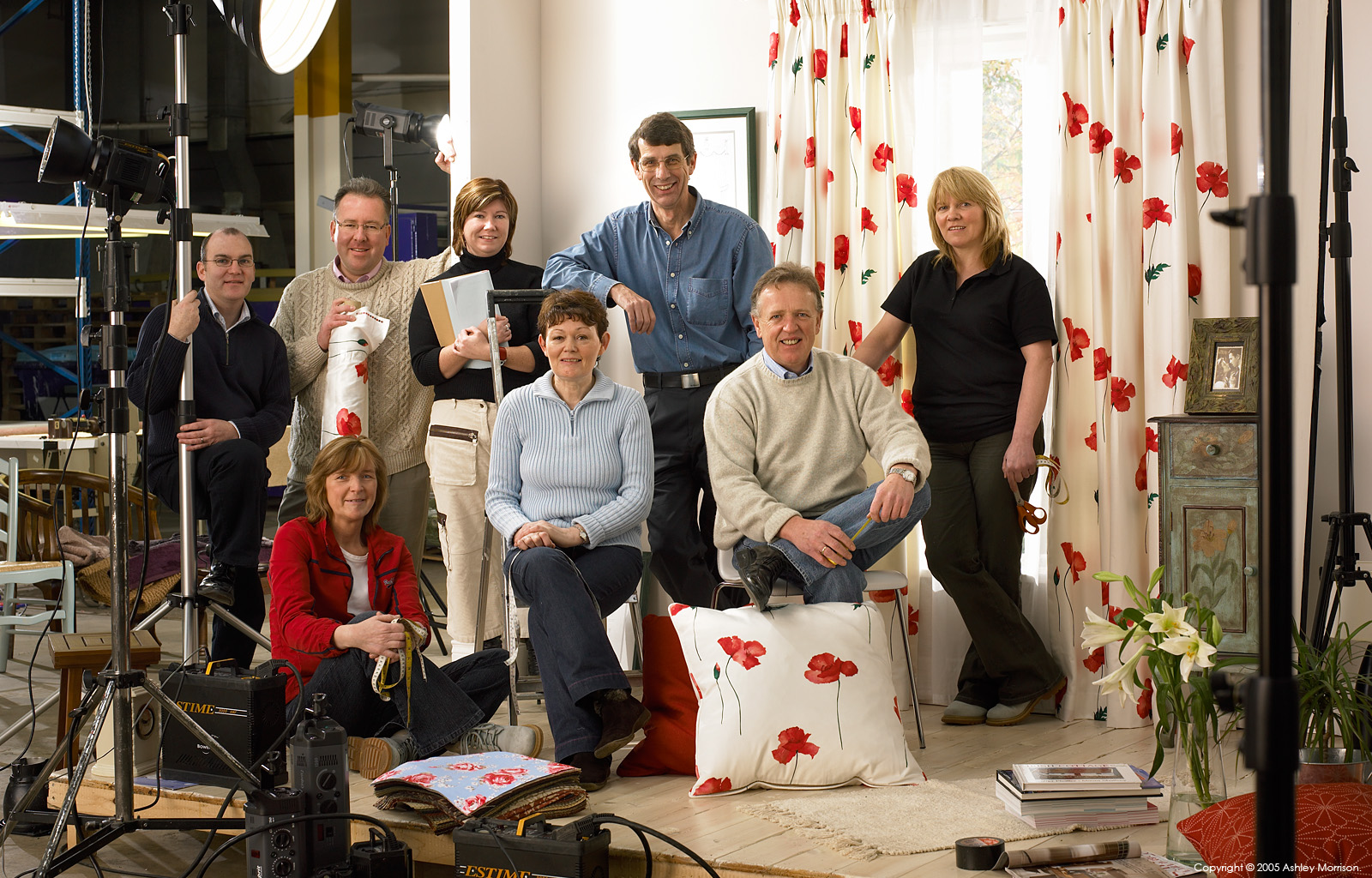 John Gallen and the Curtains-on-line team in front of the room set in their Londonderry factory by Ashley Morrison.