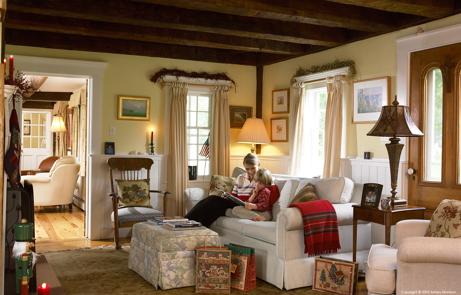Jackie Ennis & her son in their New England farmhouse near Stowe in Vermont at Christmas by Ashley Morrison.