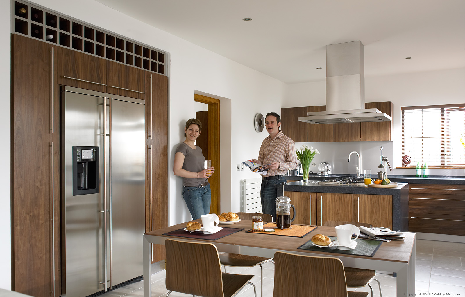 Vera Dengler and Patrick Murray in the kitchen of their semi detached house in a new development on the outskirts of Belfast.