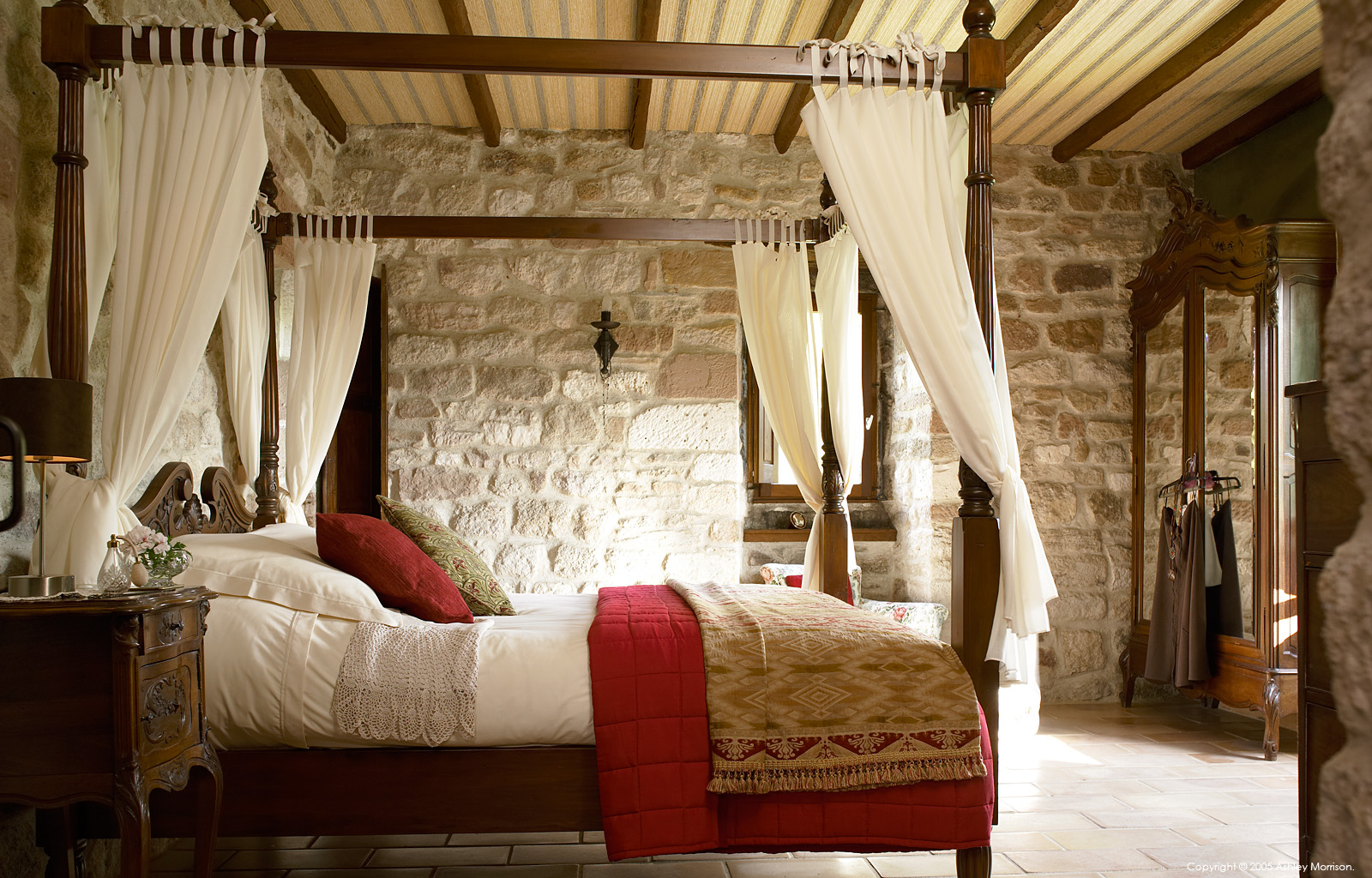 Master bedroom in Angela & John Goodwin's Tower house in the Tarn region of France.