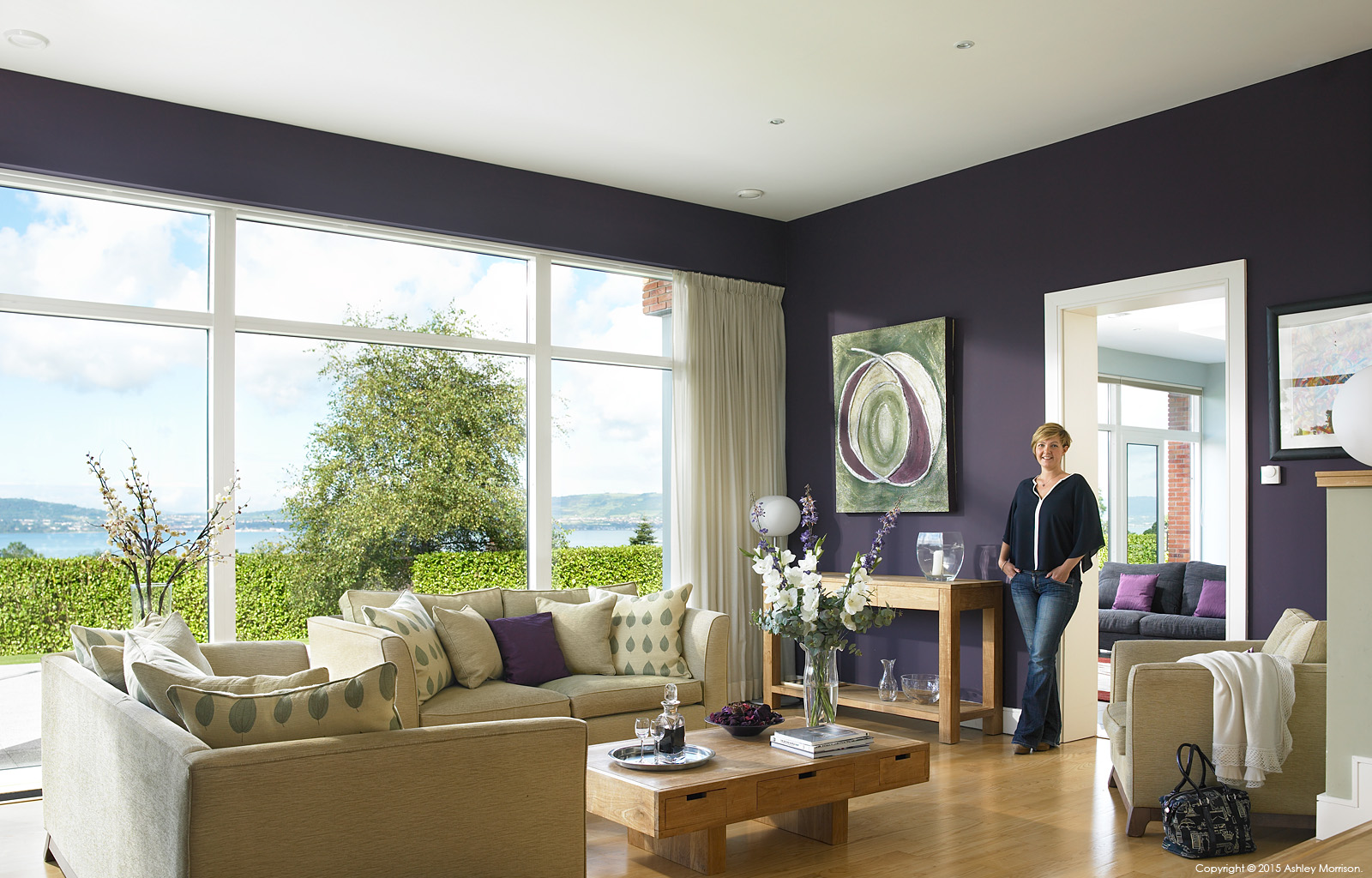 Anna McMinnis in the living room area of her contemporary detached house which overlooks the County Down town of Holywood and Belfast Lough.
