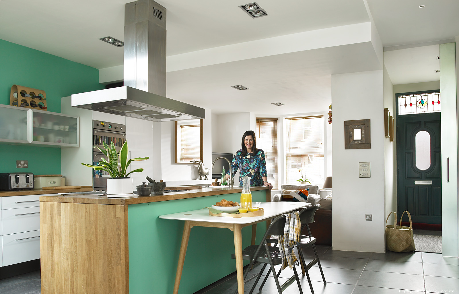 Siobhan McQuillan in the kitchen area of her semi detached home in Belfast.