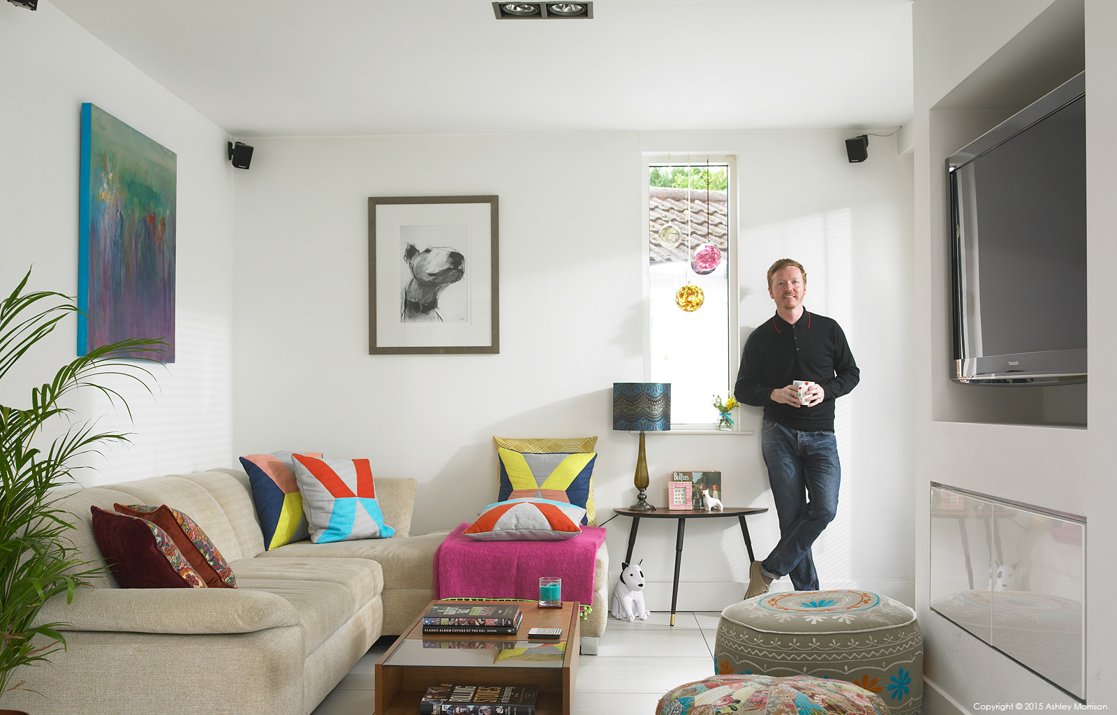 Graham Swail in the living room area of his semi-detached house in the Belmont area of Belfast.